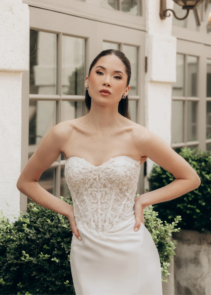 bride wearing strapless sweetheart wedding dress by Stella York in Orlando bridal boutique