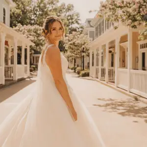 Wedding dresses near Disney World: bride in an elegant gown on Celebration Avenue, minutes from Walt Disney World Resort.